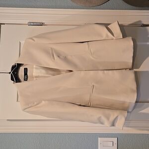 Zara cream blazer, runs small through the chest.